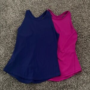 Two Lululemon razorback high neck tennis tank tops